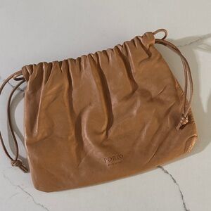 Porto drawstring clutch